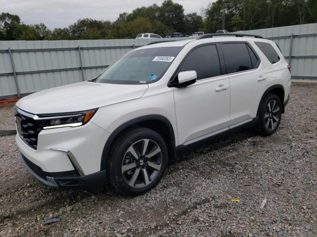 HONDA PILOT TOUR 2023 with VIN 5FNYG1H71PB054103 - Photo from auction