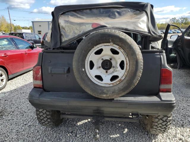 Photo 6 from auction – 1998 CHEVROLET TRACKER with VIN 2CNBJ1865W6901283