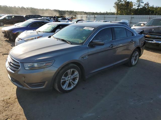 FORD TAURUS SEL 2014 with VIN 1FAHP2E8XEG160013 - Photo from auction