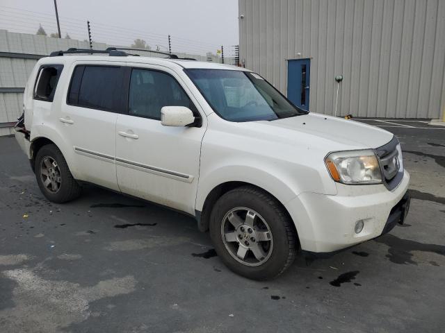 Photo 4 from auction – 2011 HONDA PILOT TOUR with VIN 5FNYF4H9XBB019770