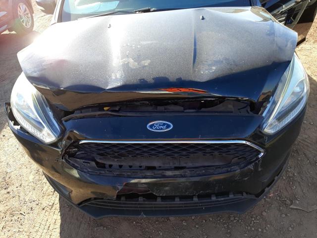 Photo 11 from auction – 2016 FORD FOCUS SE with VIN 1FADP3K27GL315101