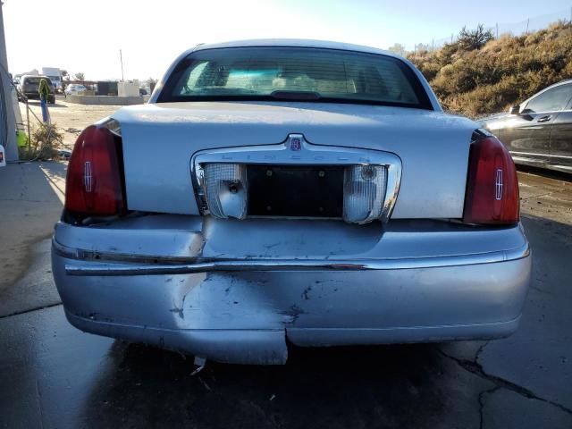 Photo 6 from auction – 2000 LINCOLN TOWN CAR E with VIN 1LNHM81W2YY894312