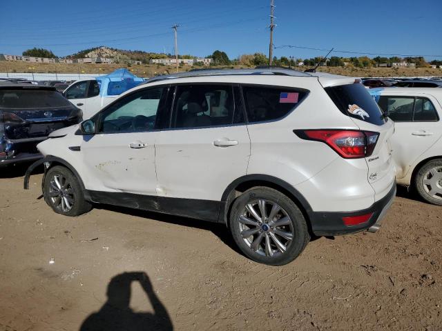 Photo 2 from auction – 2017 FORD ESCAPE TIT with VIN 1FMCU9J9XHUD41232