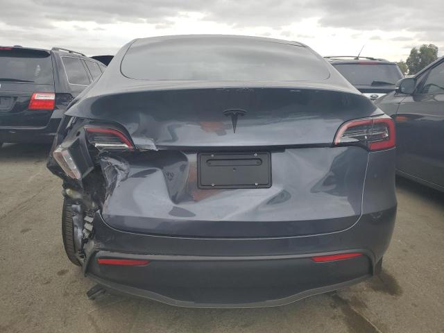 Photo 6 from auction – 2023 TESLA MODEL Y with VIN 7SAYGDEF1PF665054