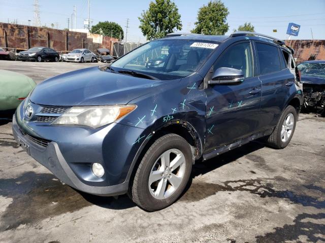 TOYOTA RAV4 XLE 2014 with VIN JTMWFREV0ED029810 - Photo from auction