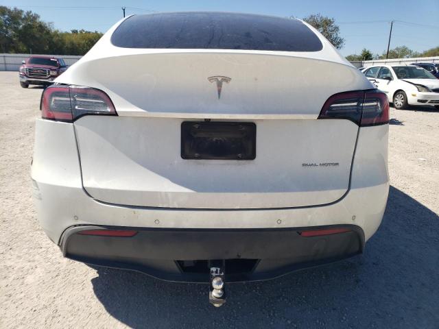 Foto 6 de la subasta – 2021 TESLA MODEL Y con VIN 5YJYGAEE6MF149304
