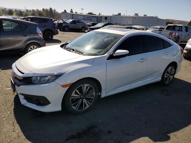 HONDA CIVIC EX 2017 with VIN 19XFC1F34HE205056 - Photo from auction
