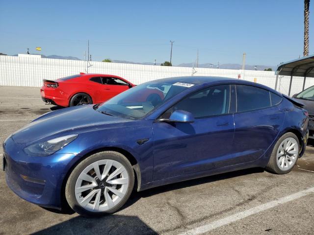 TESLA MODEL 3 2021 with VIN 5YJ3E1EBXMF975451 - Photo from auction