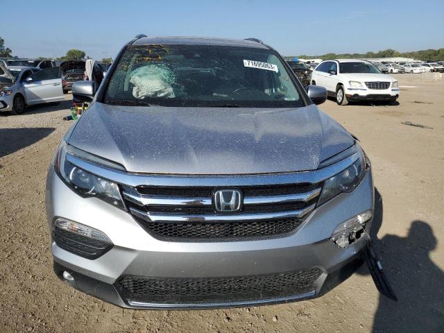 Photo 5 from auction – 2016 HONDA PILOT with VIN 5FNYF6H99GB054772