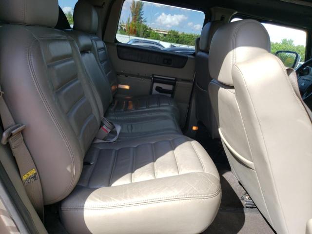 Фото 11 с аукциона – 2003 HUMMER H2 с VIN 5GRGN23U03H139463