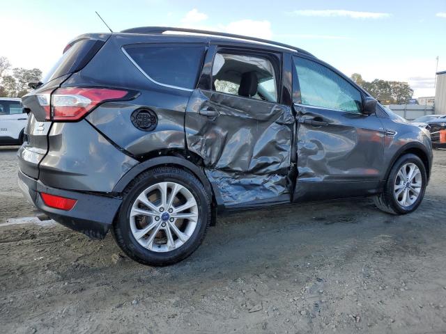 Photo 3 from auction – 2018 FORD ESCAPE SE with VIN 1FMCU0GD8JUB07586