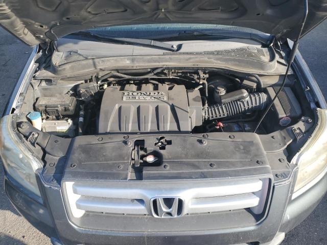 Photo 12 from auction – 2006 HONDA PILOT EX with VIN 5FNYF28526B039874