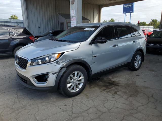 KIA SORENTO LX 2016 with VIN 5XYPG4A35GG019707 - Photo from auction
