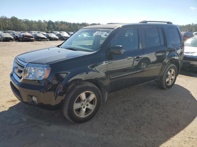 HONDA PILOT EXL 2011 with VIN 5FNYF3H56BB034824 - Photo from auction