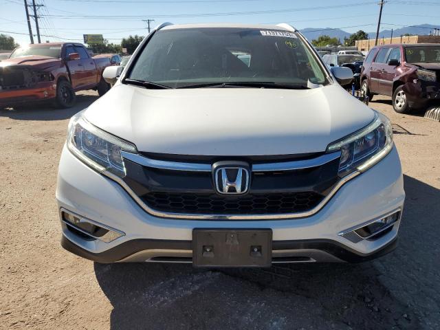Photo 5 from auction – 2016 HONDA CR-V with VIN 5J6RM4H78GL036056