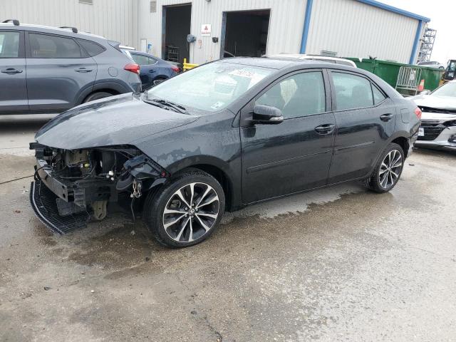 TOYOTA COROLLA L 2017 with VIN 5YFBURHE7HP574873 - Photo from auction
