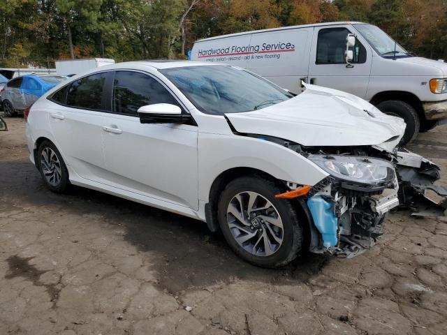 Photo 4 from auction – 2018 HONDA CIVIC EX with VIN 19XFC2F77JE021129