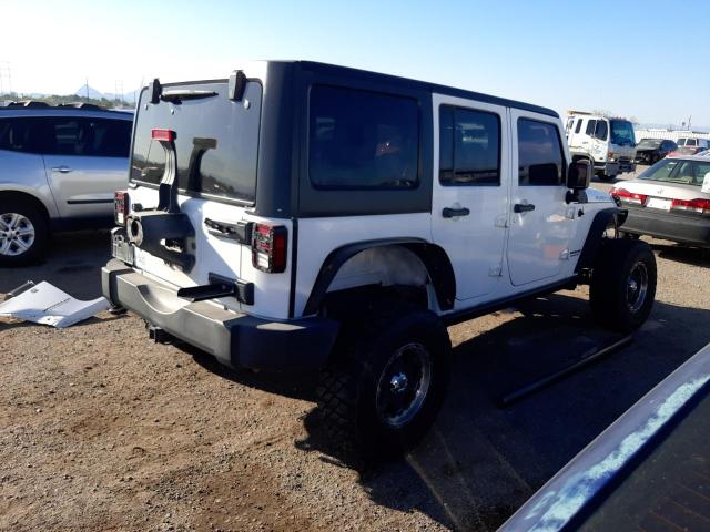 Photo 3 from auction – 2011 JEEP WRANGLER U with VIN 1J4BA6H10BL578228