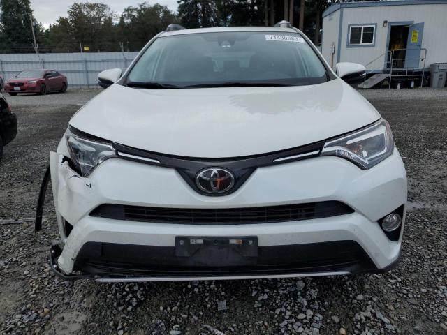 Photo 5 from auction – 2018 TOYOTA RAV4 LIMIT with VIN JTMDFREV5JD233696