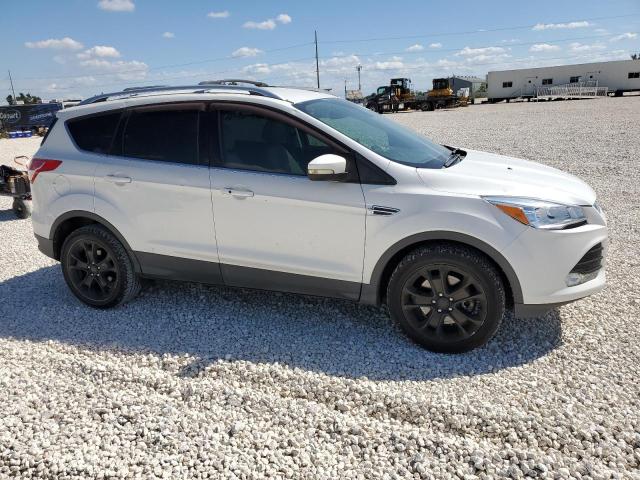 Photo 4 from auction – 2016 FORD ESCAPE TIT with VIN 1FMCU9J91GUA22395
