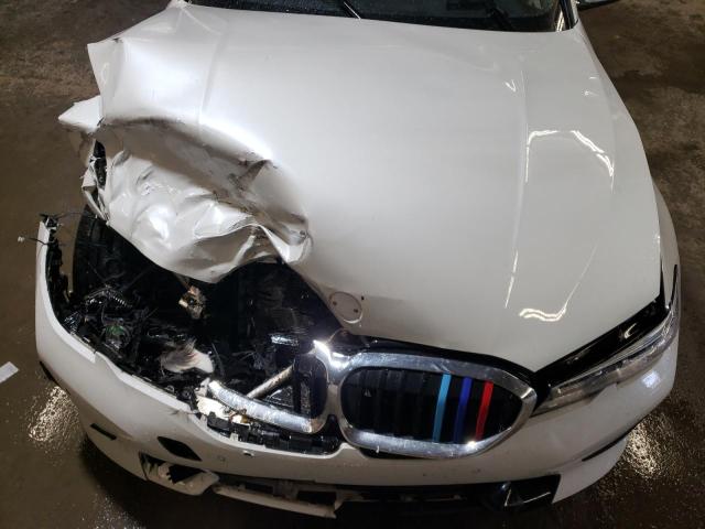 Photo 11 from auction – 2021 BMW 330E with VIN 3MW5P7J04M8C17066