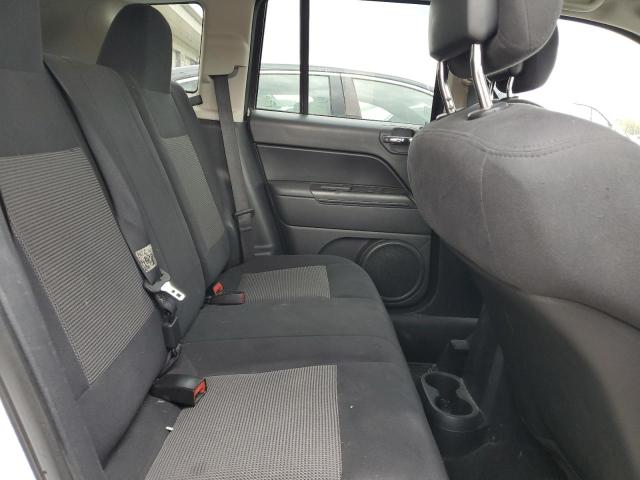 Photo 11 from auction – 2011 JEEP COMPASS SP with VIN 1J4NT1FB2BD228275
