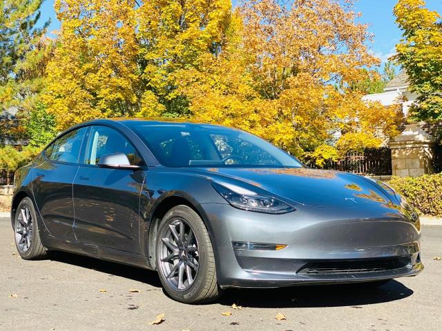 TESLA MODEL 3 2023 with VIN 5YJ3E1EA9PF396883 - Photo from auction