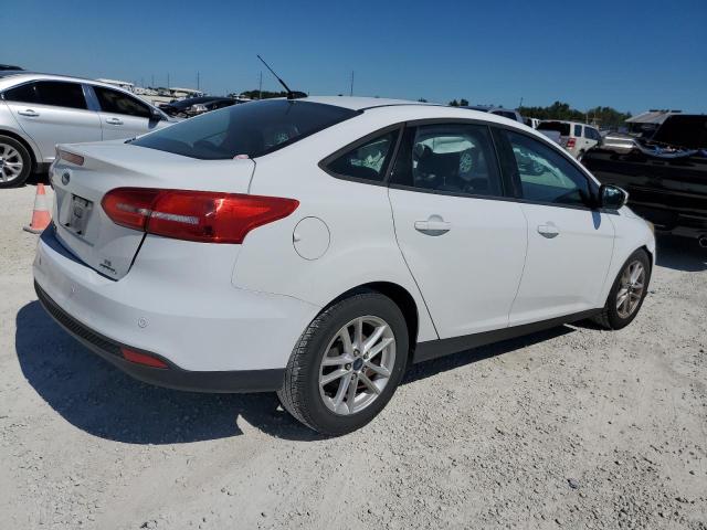 Photo 3 from auction – 2016 FORD FOCUS SE with VIN 1FADP3F21GL250000