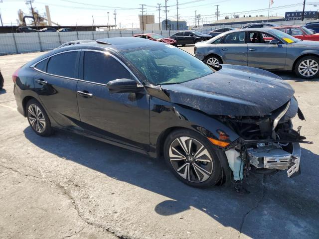 Photo 4 from auction – 2018 HONDA CIVIC EXL with VIN 2HGFC1F71JH642091