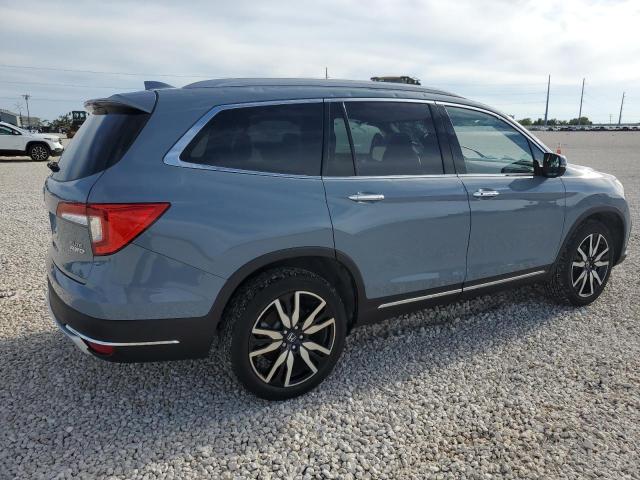 Photo 3 from auction – 2022 HONDA PILOT ELIT with VIN 5FNYF6H04NB039353