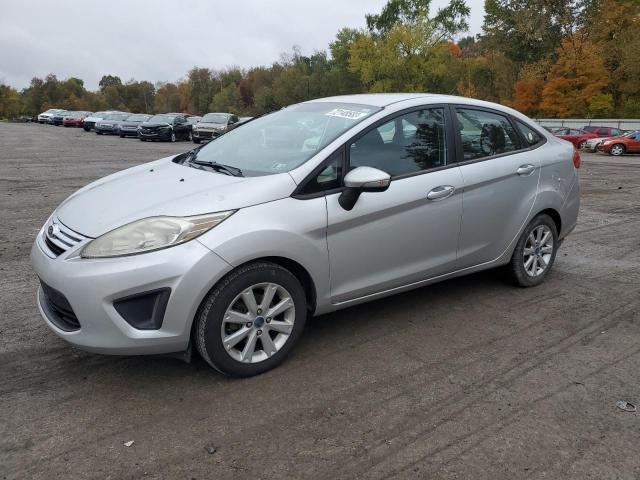 FORD FIESTA SE 2013 with VIN 3FADP4BJ8DM122950 - Photo from auction