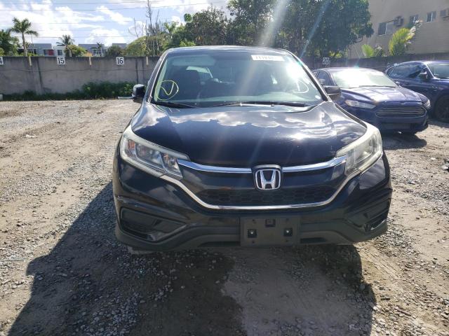 Photo 5 from auction – 2016 HONDA CR-V LX with VIN 2HKRM3H39GH547860