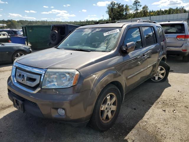 HONDA PILOT TOUR 2011 with VIN 5FNYF4H92BB063455 - Photo from auction