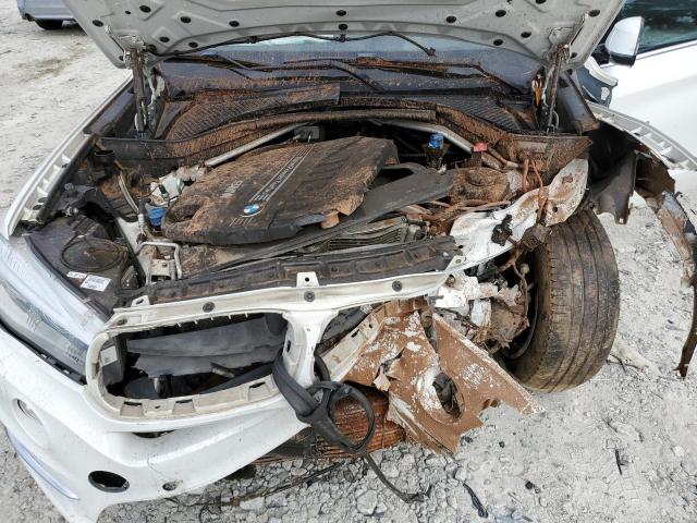 Photo 11 from auction – 2014 BMW X5 XDRIVE3 with VIN 5UXKS4C50E0J93872