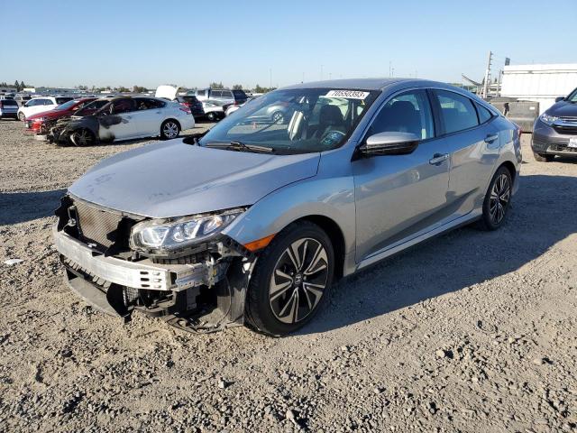 HONDA CIVIC EX 2018 with VIN JHMFC1F35JX016095 - Photo from auction