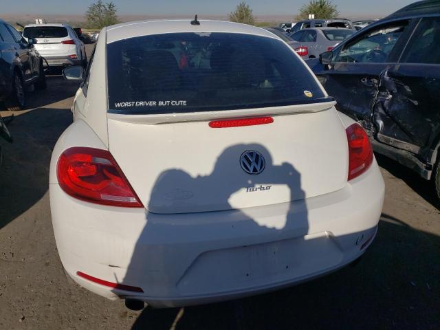 Photo 6 from auction – 2012 VOLKSWAGEN BEETLE TUR with VIN 3VWVA7ATXCM605419