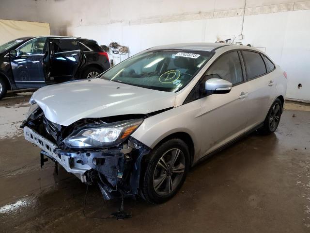 FORD FOCUS SE 2014 with VIN 1FADP3F21EL374832 - Photo from auction