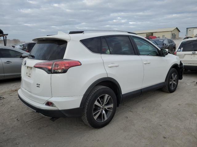 Photo 3 from auction – 2016 TOYOTA RAV4 XLE with VIN 2T3RFREV8GW475657