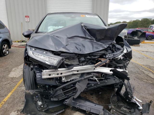 Photo 5 from auction – 2023 HONDA ODYSSEY EX with VIN 5FNRL6H65PB024302