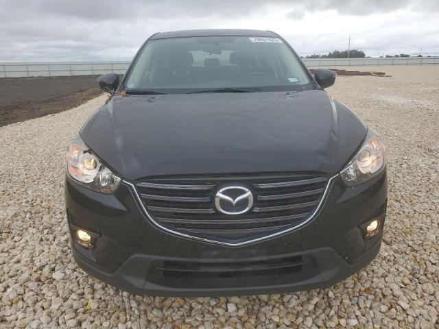 Photo 5 from auction – 2016 MAZDA CX-5 TOURI with VIN JM3KE2CY2G0828091