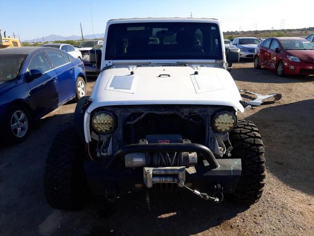 Photo 5 from auction – 2011 JEEP WRANGLER U with VIN 1J4BA6H10BL578228