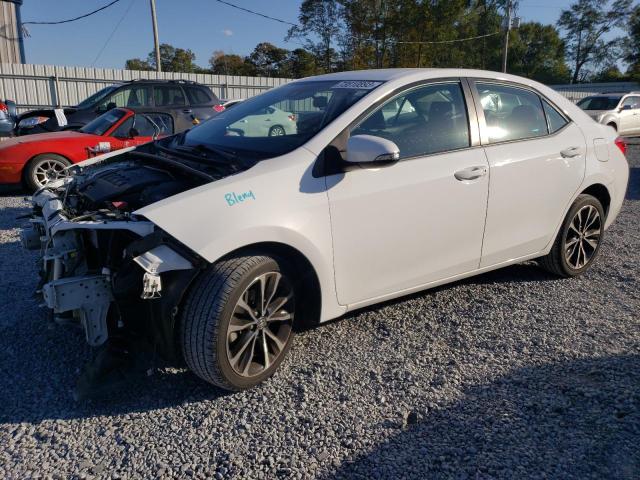 TOYOTA COROLLA L 2018 with VIN 5YFBURHE2JP769401 - Photo from auction
