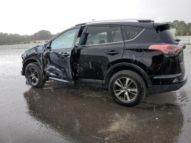 Photo 2 from auction – 2016 TOYOTA RAV4 XLE with VIN 2T3RFREV0GW460263