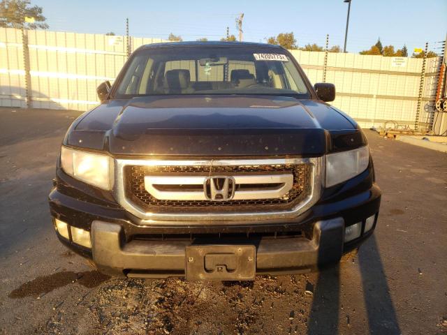 Photo 5 from auction – 2010 HONDA RIDGELINE with VIN 5FPYK1F50AB003304