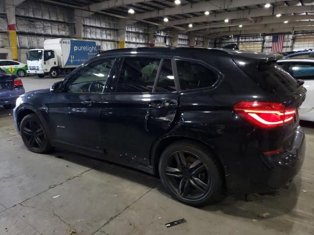 Photo 2 from auction – 2016 BMW X1 XDRIVE2 with VIN WBXHT3C34G5E53591