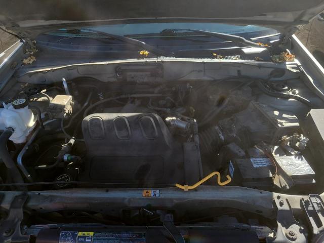 Photo 12 from auction – 2003 FORD ESCAPE LIM with VIN 1FMCU94113KB24565