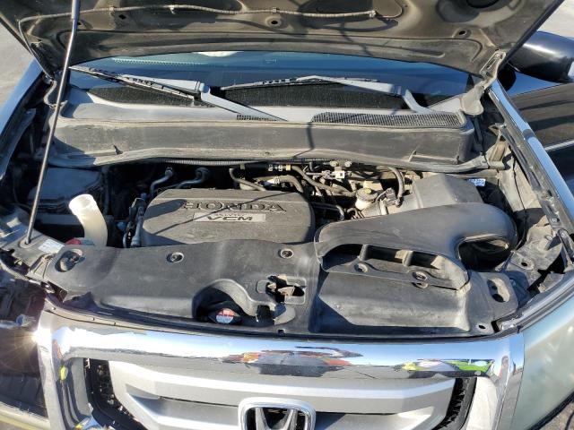 Photo 12 from auction – 2010 HONDA PILOT TOUR with VIN 5FNYF4H90AB025205