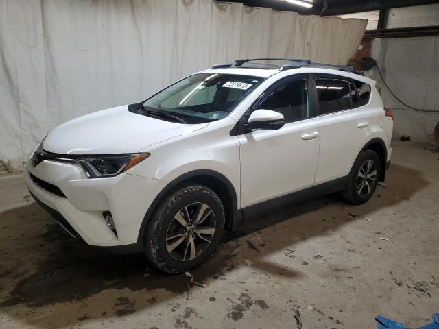 TOYOTA RAV4 ADVEN 2018 with VIN 2T3RFREV2JW704034 - Photo from auction