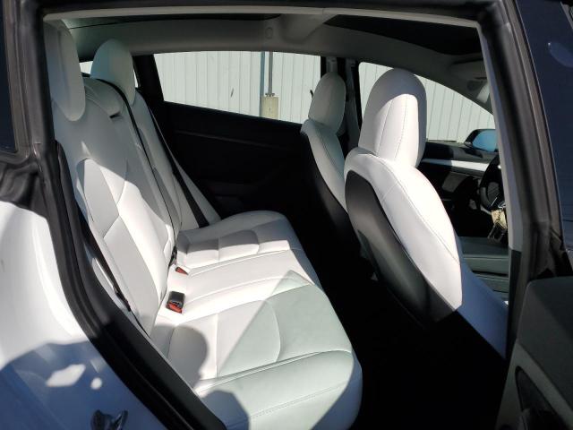 Photo 11 from auction – 2021 TESLA MODEL 3 with VIN 5YJ3E1EB2MF981440