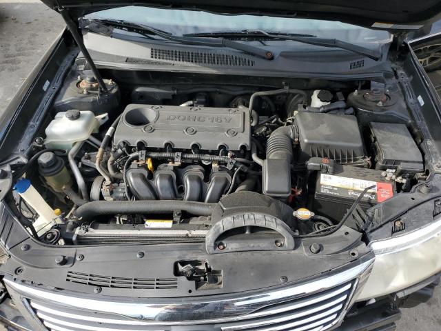Photo 11 from auction – 2009 KIA OPTIMA LX with VIN KNAGE228595322399